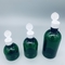 深緑色の空の卸売50ml 100ml 150mlの円形の注文のシャンプーのびんは化粧品のプラスチック ポンプびんをかわいがる